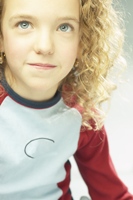 Photo of a girl watching someone to illustrate the power of our Christian example